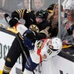 Boston Bruins' Pat Maroon (61) checks Florida Panthers' Oliver Ekman-Larsson (91) during the first period in Game 3 of an NHL hockey Stanley Cup second-round playoff series Friday, May 10, 2024, in Boston.
