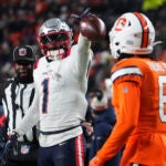 New England Patriots wide receiver DeVante Parker (1) celebrates a play against the Denver Broncos of an NFL football game Sunday December 24, 2023, in Denver.