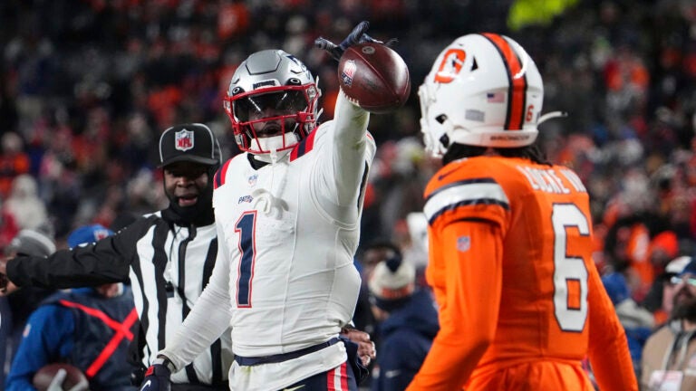 New England Patriots wide receiver DeVante Parker (1) celebrates a play against the Denver Broncos of an NFL football game Sunday December 24, 2023, in Denver.