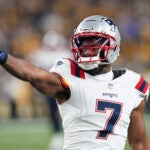 New England Patriots wide receiver JuJu Smith-Schuster celebrates catching a 37-yard pass during the first half of an NFL football game against the Pittsburgh Steelers on Thursday, Dec. 7, 2023, in Pittsburgh.
