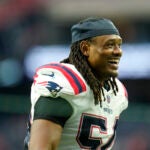 New England Patriots linebacker Dont'a Hightower (54) smiles after an NFL football game against the Houston Texans, Sunday, Oct. 10, 2021, in Houston.