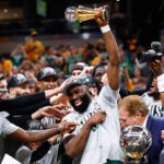 Boston Celtics guard Jaylen Brown (7) holds up his award after winning Game 4 of the NBA Eastern Conference Finals. The Indiana Pacers hosted the Boston Celtics at Gainbridge Fieldhouse in Indianapolis on Monday, May 27, 2024.