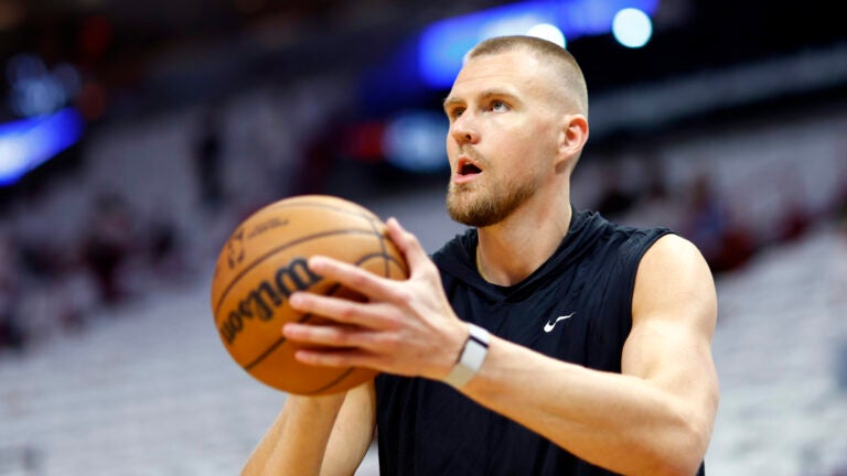 Boston Celtics center Kristaps Porzingis warms up before taking on the Miami Heat in game three of the NBA Eastern Conference Playoffs.