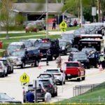 Law enforcement personnel respond to a report of a person armed with a rifle at Mount Horeb Middle School in Mount Horeb, Wis., Wednesday, May 1, 2024.