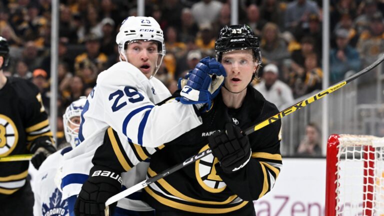 BOSTON, MASSACHUSETTS - APRIL 20: Pontus Holmberg #29 of the Toronto Maple Leafs shoves Danton Heinen #43 of the Boston Bruins in front of the net during the first period in Game One of the First Round of the 2024 Stanley Cup Playoffs at TD Garden on April 20, 2024 in Boston, Massachusetts.