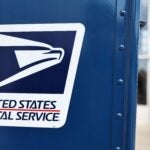 FILE - A United States Postal Service logo is displayed on a U.S. Post Office mailbox on April 1, 2024 in Montclair, California.