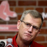 Boston, MA — 10/02/2023 - President of the Boston Red Sox Sam Kennedy listens to a question during the Red Sox season-ending press conference.