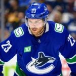 VANCOUVER, CANADA - MAY 8: Elias Lindholm #23 of the Vancouver Canucks waits for a face-off during the first period in Game One of the Second Round of the 2024 Stanley Cup Playoffs against the Edmonton Oilers at Rogers Arena on May 8, 2024 in Vancouver, British Columbia, Canada