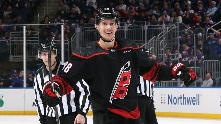 ELMONT, NEW YORK - MARCH 19: Martin Necas #88 of the Carolina Hurricanes celebrates his goal at 19:59 of the first period against the New York Islanders at UBS Arena on March 19, 2024 in Elmont, New York.