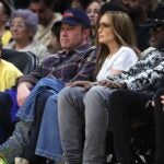 Actors Ben Affleck and Jennifer Lopez look on from the front row during the first half of a game between the Golden State Warriors and the Los Angeles Lakers at Crypto.com Arena on March 16, 2024, in Los Angeles.