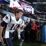 Tom Brady leads the team on the field before Super Bowl LII. The New England Patriots play the Philadelphia Eagles in Super Bowl LII at US Bank Stadium in Minneapolis on Feb. 4, 2018.