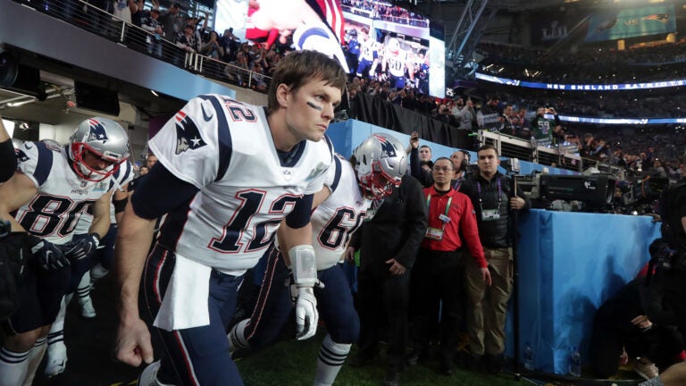 Tom Brady leads the team on the field before Super Bowl LII. The New England Patriots play the Philadelphia Eagles in Super Bowl LII at US Bank Stadium in Minneapolis on Feb. 4, 2018.