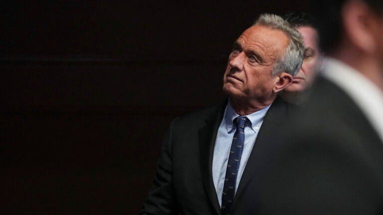 Robert F. Kennedy Jr., an independent presidential candidate, listens as Nicole Shanahan delivers remarks.