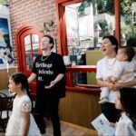 Mark Zuckerberg and his family at his 40th birthday party, which included a replica of Pinocchio's Pizza in Harvard Square.