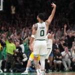 Boston Celtics forward Jayson Tatum (0) signals his three pointer is good on a night when he wasn’t hitting much for a 127-123 lead in overtime. The Boston Celtics host the Indiana Pacers in Game 1 of the NBA Eastern Conference Finals.