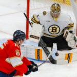 Bruins goaltender Jeremy Swayman denies Florida Panthers center Anton Lundell during second period.