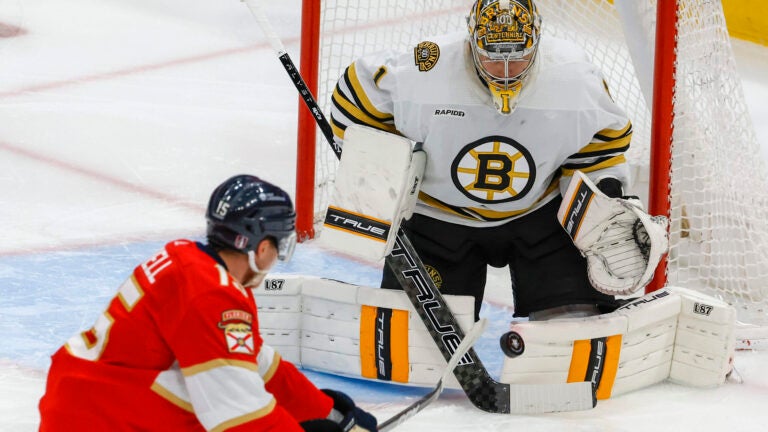 Bruins goaltender Jeremy Swayman denies Florida Panthers center Anton Lundell during second period.