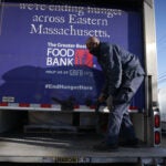 A truck is unloaded at the Greater Boston Food Bank.