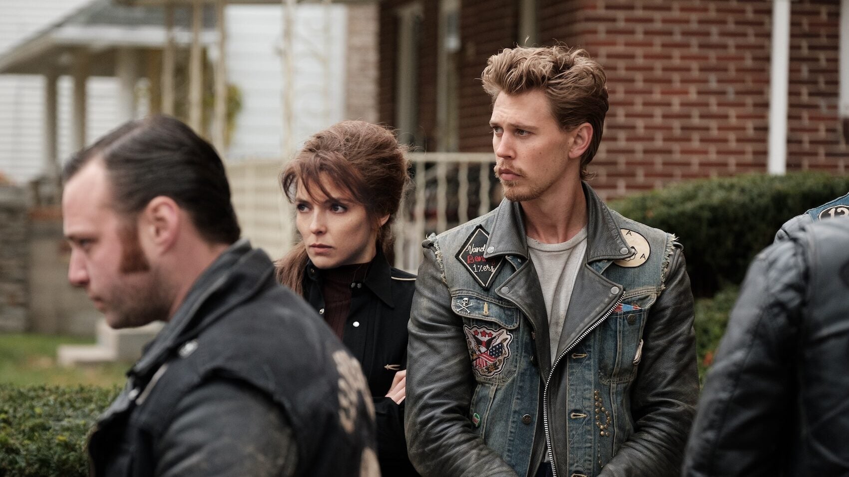 Emory Cohen as Cockroach,  Jodie Comer as Kathy and Austin Butler as Benny in director Jeff Nichols' "The Bikeriders."