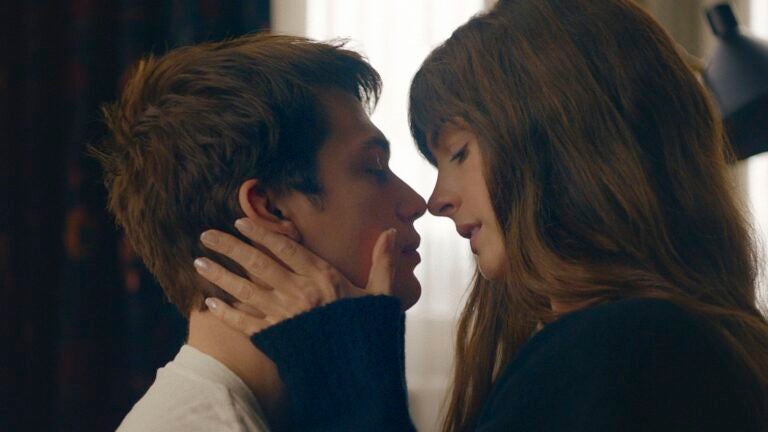 Nicholas Galitzine, left, and Anne Hathaway in a scene from "The Idea of You."