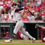 Rob Refsnyder of the Red Sox hits a home run in the sixth inning against the Cincinnati Reds at Great American Ball Park on June 23, 2024 in Cincinnati, Ohio.