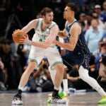 Boston Celtics center Luke Kornet (40) dribbles during the fourth quarter in Game 4 of the NBA Finals. The Dallas Mavericks hosted the Boston Celtics at American Airlines Center on Friday, June 14, 2024.