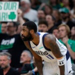Dallas Mavericks guard Kyrie Irving (11) watches a play during the third quarter in Game 2 of the NBA Finals. The Boston Celtics hosted the Dallas Mavericks at TD Garden on Sunday, June 9, 2024.