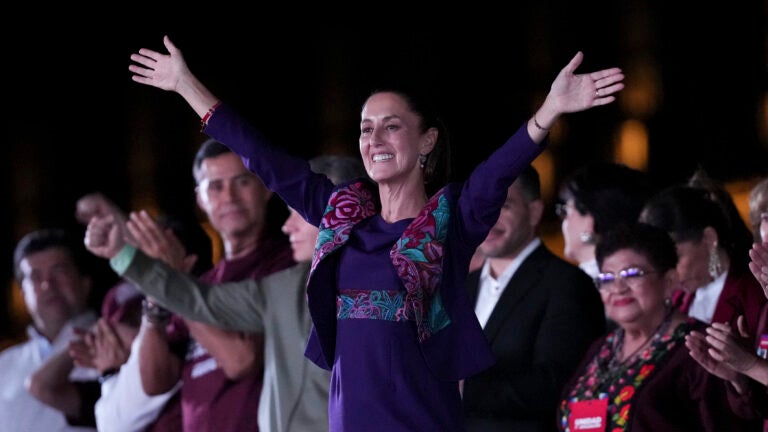 President-elect Claudia Sheinbaum waves to supporters at the Zocalo, Mexico City's main square.