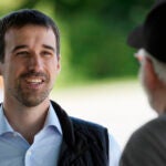 State Rep. Austin Theriault, R-Fort Kent, speaks with a voter.