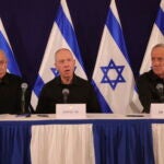 Israeli Prime Minister Benjamin Netanyahu, Defense Minister Yoav Gallant and Cabinet Minister Benny Gantz speak during a news conference.