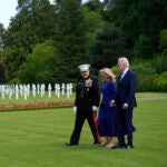 President Joe Biden and First Lady Jill Biden walk with Major General Robert B. Sofge Jr. as they attend a wreath laying ceremony at the Aisne-Marne American World War One Cemetery in Belleau, France, Sunday, June 9, 2024.