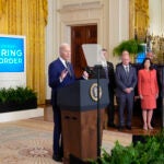 President Joe Biden, left, speaks about an executive order in the East Room at the White House in Washington, Tuesday, June 4, 2024. Biden unveiled plans to enact immediate significant restrictions on migrants seeking asylum at the U.S.-Mexico border as the White House tries to neutralize immigration as a political liability ahead of the November elections.
