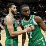 Jayson Tatum #0 of the Boston Celtics and Jaylen Brown #7 of the Boston Celtics celebrate after Game Four of the Eastern Conference Second Round Playoffs at Rocket Mortgage Fieldhouse on May 13, 2024 in Cleveland, Ohio.
