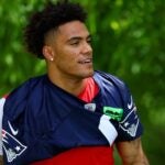 FOXBOROUGH, MASSACHUSETTS - MAY 29: Christian Gonzalez #0 of the New England Patriots walks to the field during the New England Patriots OTA Offseason Workout on May 29, 2024 in Foxborough, Massachusetts.
