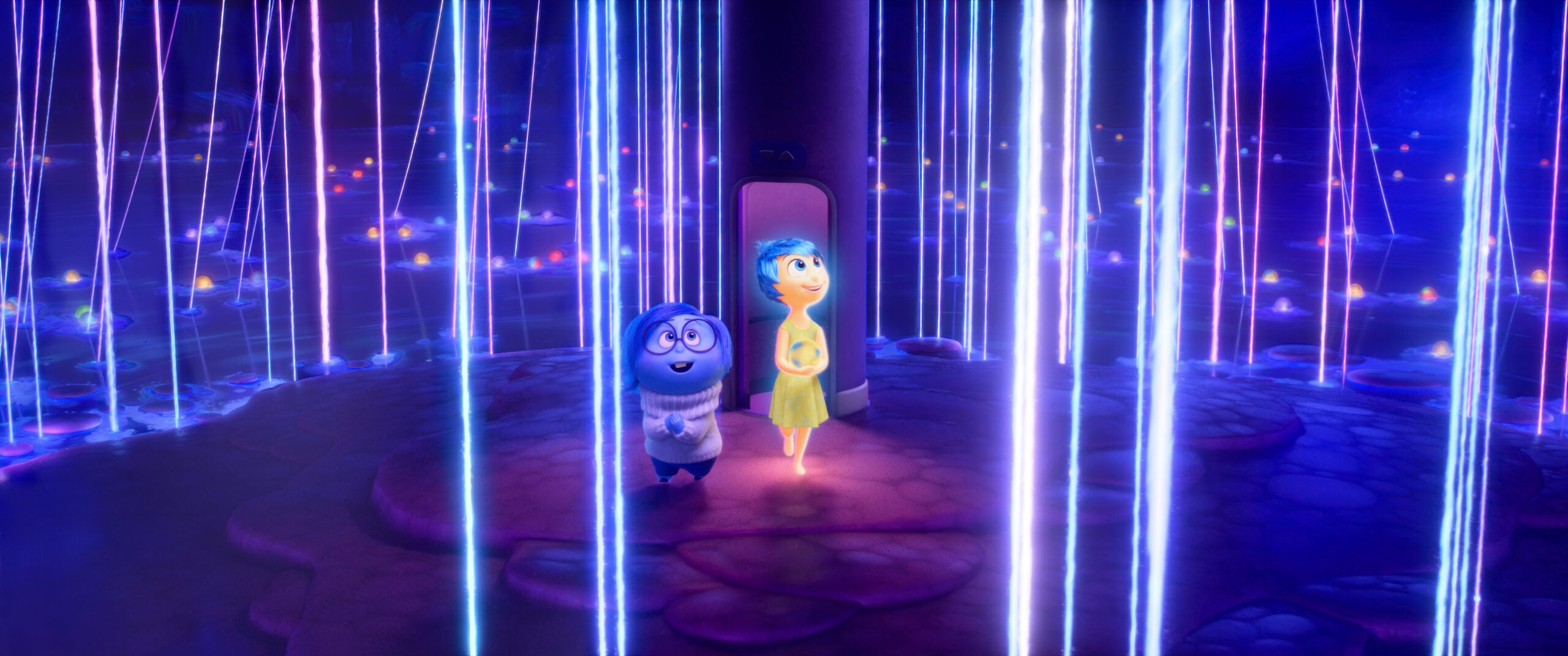 Sadness (Phyllis Smith) and Joy (Amy Poehler) explore Riley's Sense of Self in "Inside Out 2."