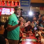 BOSTON, MASSACHUSETTS - JUNE 20: National Champion and Celtics Center Al Horford celebrates career-first NBA Championship Title at Raising Cane's on June 20, 2024 in Boston, Massachusetts.