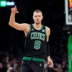 Boston Celtics' Kristaps Porzingis plays against the Dallas Mavericks during the first half of an NBA basketball game, Friday, March 1, 2024, in Boston.