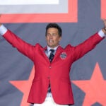 Former New England Patriots quarterback Tom Brady waves to the crowd at the conclusion of the Patriots Hall of Fame induction ceremonies for Brady at Gillette Stadium, Wednesday, June 12, 2024, in Foxborough, Mass.