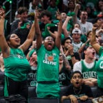 Fans react during a watch party for Game 4 of the NBA Finals in TD Garden on Friday.