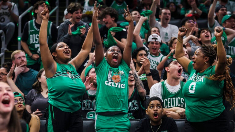Fans react during a watch party for Game 4 of the NBA Finals in TD Garden on Friday.