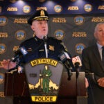 Methuen Police Chief Scott McNamara (L) spoke a press conference held to discuss the incident in which multiple people were struck by gunfire overnight.