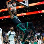 Boston Celtics guard Jaylen Brown (7) dunks during the first quarter in Game 2 of the NBA Finals. The Boston Celtics hosted the Dallas Mavericks at TD Garden on Sunday, June 9, 2024.