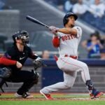 Enmanuel Valdez of the Red Sox hits a solo home run in the fourth inning.