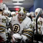 PHILADELPHIA, PENNSYLVANIA - JANUARY 27: Linus Ullmark #35 of the Boston Bruins greets teammates before playing against the Philadelphia Flyers at the Wells Fargo Center on January 27, 2024 in Philadelphia, Pennsylvania.
