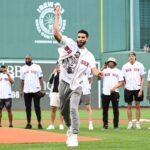 BOSTON, MASSACHUSETTS - JUNE 24: Jayson Tatum #0 of the Boston Celtics throws a ceremonial first pitch before a game between the Toronto Blue Jays and the Boston Red Sox at Fenway Park on June 24, 2024 in Boston, Massachusetts.