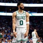 Boston Celtics forward Jayson Tatum (0) reacts after he draws a foul during the second quarter in Game 4 of the NBA Finals. The Dallas Mavericks hosted the Boston Celtics at American Airlines Center on Friday, June 14, 2024.