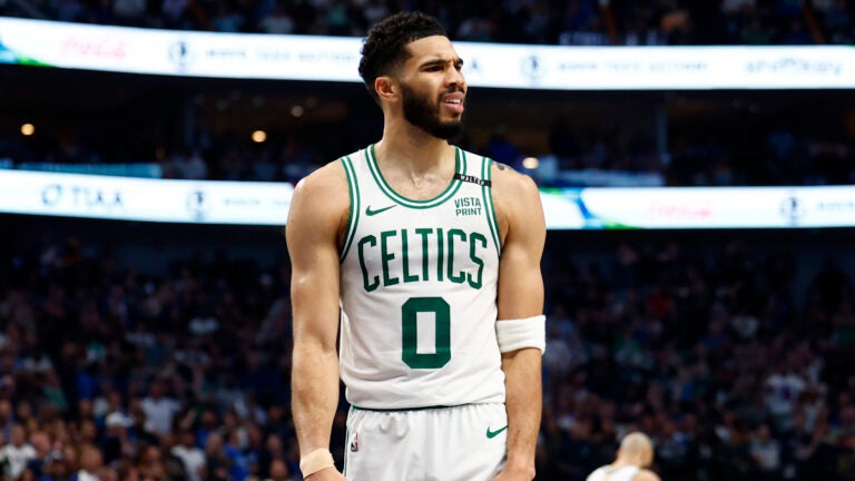 Boston Celtics forward Jayson Tatum (0) reacts after he draws a foul during the second quarter in Game 4 of the NBA Finals. The Dallas Mavericks hosted the Boston Celtics at American Airlines Center on Friday, June 14, 2024.