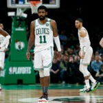 Boston Celtics' Kyrie Irving (11) and teammates, from left to right, Jaylen Brown, Marcus Morris, Jayson Tatum and Gordon Hayward wait for the ball to be put in play by the Milwaukee Bucks during the second half of Game 4 of a second-round NBA basketball playoff series in Boston, Monday, May 6, 2019.