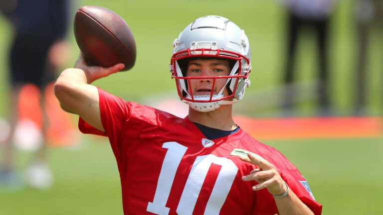 The Patriots held OTA’s at the Gillette Stadium practice field. Qb Drake Maye makes a pass during a drill.