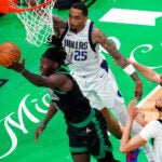 Boston Celtics guard Jrue Holiday (4) goes up for an easy layup after a assist from Boston Celtics forward Jayson Tatum (0) during the (second quarter) in Game 2 of the NBA Finals. The Boston Celtics hosted the Dallas Mavericks at TD Garden on Sunday, June 9, 2024.